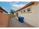 The backyard showcases gravel landscaping, a block wall, and windows for natural light at 859 S Bristol --, Mesa, AZ 85208