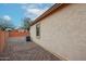 Desert backyard with rock landscaping, block wall, and air conditioning unit at 859 S Bristol --, Mesa, AZ 85208