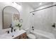 Well-lit bathroom with shower and bath, vanity with sink, and modern fixtures at 859 S Bristol --, Mesa, AZ 85208