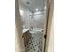 Charming bathroom with modern vanity, patterned floor, and tiled shower/tub combination at 859 S Bristol --, Mesa, AZ 85208