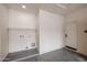 Functional garage area with convenient laundry hookups and access door at 859 S Bristol --, Mesa, AZ 85208