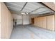 View of the garage showcasing built-in cabinets, laundry hookups, and ample storage space at 859 S Bristol --, Mesa, AZ 85208