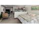 Comfortable and versatile guest suite offering a sleeping area, a sink, and a cozy sitting area at 923 E Aire Libre Ave, Phoenix, AZ 85022