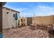 Private backyard features brick flooring, custom planter and manicured landscaping at 1010 E Redfield Rd, Tempe, AZ 85283