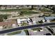 Aerial view showcases the property's location with the golf course and neighborhood at 10416 W Prairie Hills Cir, Sun City, AZ 85351