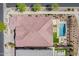 Aerial view of the home highlighting the tile roof, backyard pool, patio, and landscaping at 10717 E Tarragon Ave, Mesa, AZ 85212