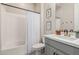 Well lit bathroom featuring a shower/tub combo, modern vanity and neutral tones at 10717 E Tarragon Ave, Mesa, AZ 85212