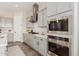 Modern kitchen featuring stainless steel appliances, gray cabinets, and a subway tile backsplash at 10717 E Tarragon Ave, Mesa, AZ 85212