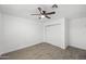 Clean bedroom featuring a ceiling fan and a closet with sliding doors at 10947 W Mohave St, Avondale, AZ 85323