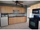 Kitchen with stainless steel appliances and a ceiling fan at 11410 N 105Th Ave, Sun City, AZ 85351