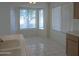 Cozy breakfast nook with bay window, providing ample sunlight and views at 12046 S 44Th St, Phoenix, AZ 85044