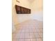 Bright dining room with tile flooring, a window, and upper cabinets at 12046 S 44Th St, Phoenix, AZ 85044