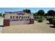 A view of the attractive signage for Surprise Community Park in a well maintained neighborhood at 13646 W Fargo Dr, Surprise, AZ 85374