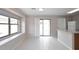 Bright dining area features tile flooring, a large window, and sliding glass doors at 13646 W Fargo Dr, Surprise, AZ 85374