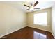 Bright bedroom with hardwood floors, a ceiling fan, and lots of light at 1406 W Charleston Ave, Phoenix, AZ 85023