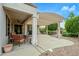 Charming covered patio with comfortable seating area, offering a relaxing outdoor space at 15750 W Linksview Dr, Surprise, AZ 85374