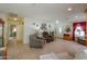 Spacious living room with tile flooring, neutral tones, and an open layout ideal for relaxation and gatherings at 1814 N Parkside Ln, Casa Grande, AZ 85122