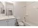 Bathroom featuring a vanity with white cabinets, a toilet, and a shower/tub combination at 2323 E Huntington Dr, Phoenix, AZ 85040