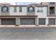 Modern townhome exterior showing multiple garages and clean architectural lines at 2323 E Huntington Dr, Phoenix, AZ 85040