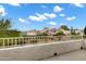 Balcony overlooking neighborhood with trees and blue skies at 30404 N 43Rd St, Cave Creek, AZ 85331