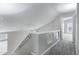 Upstairs hallway featuring carpet floors and natural light at 30404 N 43Rd St, Cave Creek, AZ 85331