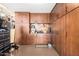 Well-organized garage featuring built-in wood cabinets and a functional workspace at 3209 W Spur Dr, Phoenix, AZ 85083