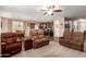 Open-concept living room flows into kitchen, offering a spacious layout for gatherings at 3209 W Spur Dr, Phoenix, AZ 85083