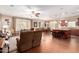 Spacious living room and dining area combo with a clear view of the modern kitchen at 3209 W Spur Dr, Phoenix, AZ 85083