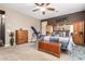 Relaxing main bedroom with neutral walls, carpet, ceiling fan and ample natural light at 3209 W Spur Dr, Phoenix, AZ 85083