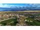 Beautiful aerial view of the desert community's golf course and surrounding neighborhood at 34463 N 99Th Way, Scottsdale, AZ 85262