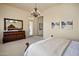 Bedroom featuring a dresser and decor at 34463 N 99Th Way, Scottsdale, AZ 85262