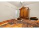 Well-lit bedroom with a bed, wardrobe and contemporary decor at 40142 W Coltin Way, Maricopa, AZ 85138