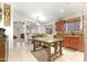 Open dining area with views into the living area and kitchen at 40142 W Coltin Way, Maricopa, AZ 85138