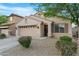 Inviting single-story home with a tidy front yard and two car garage at 40142 W Coltin Way, Maricopa, AZ 85138