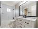 Beautifully updated bathroom with modern vanity, bathtub, and white subway tile at 4126 E Carmel Ave, Mesa, AZ 85206