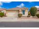 Charming single-story home featuring a two-car garage and low maintenance desert landscaping at 41304 W Rio Bravo Dr, Maricopa, AZ 85138