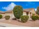 Beautiful home with desert landscaping, mature shrubs, and a well-maintained front yard at 41304 W Rio Bravo Dr, Maricopa, AZ 85138