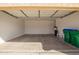 Spacious two car garage providing ample parking and storage space for vehicles and belongings at 41304 W Rio Bravo Dr, Maricopa, AZ 85138