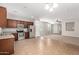 Well-equipped kitchen featuring stainless steel appliances, granite countertops, and dark wood cabinets at 41304 W Rio Bravo Dr, Maricopa, AZ 85138