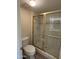 Bathroom features a toilet and glass door shower with gold trim at 4200 N Miller Rd # 321, Scottsdale, AZ 85251