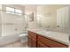 Bathroom featuring a shower with a glass door, toilet, and a vanity with light countertops at 4266 S Winter Ln, Gilbert, AZ 85297