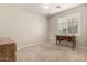 Spacious bedroom with carpet and a window featuring white shutters, providing ample natural light at 4266 S Winter Ln, Gilbert, AZ 85297