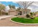 Charming single-story home with a well-maintained yard and a two-car garage at 4266 S Winter Ln, Gilbert, AZ 85297