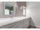 Modern bathroom featuring double vanity sinks and a luxurious glass-enclosed walk-in shower at 4537 E Towne Ln, Gilbert, AZ 85234