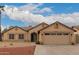 Charming single-story home featuring a well-manicured front yard and attached two-car garage at 4537 E Towne Ln, Gilbert, AZ 85234