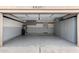 Clean, organized garage with epoxy floors and built-in gray storage cabinets at 4537 E Towne Ln, Gilbert, AZ 85234