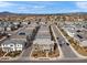 An aerial view of a well-maintained neighborhood street featuring sidewalks and landscaping at 5811 W Encinas Ln, Phoenix, AZ 85043