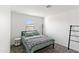 Cozy bedroom featuring neutral carpet, light walls, and a full bed at 5811 W Encinas Ln, Phoenix, AZ 85043