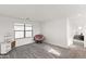 Spacious bedroom features neutral carpet and great light at 5811 W Encinas Ln, Phoenix, AZ 85043