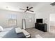 Main bedroom boasts neutral carpet, lots of natural light, and dark wood furniture at 5811 W Encinas Ln, Phoenix, AZ 85043